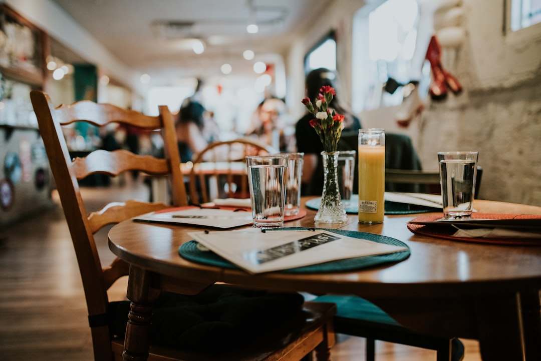 Food writer reviewing restaurant taking notes