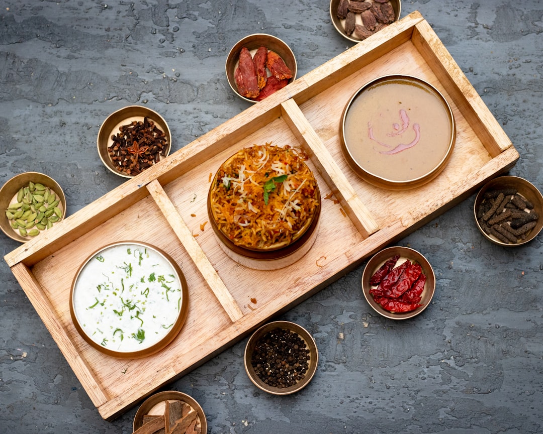 Lamb curry in traditional clay pot with rice