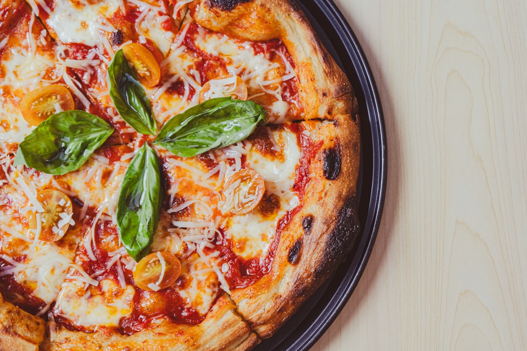 Italian restaurant food spread with wood-fired pizza and fresh pasta at iO Italian Osteria